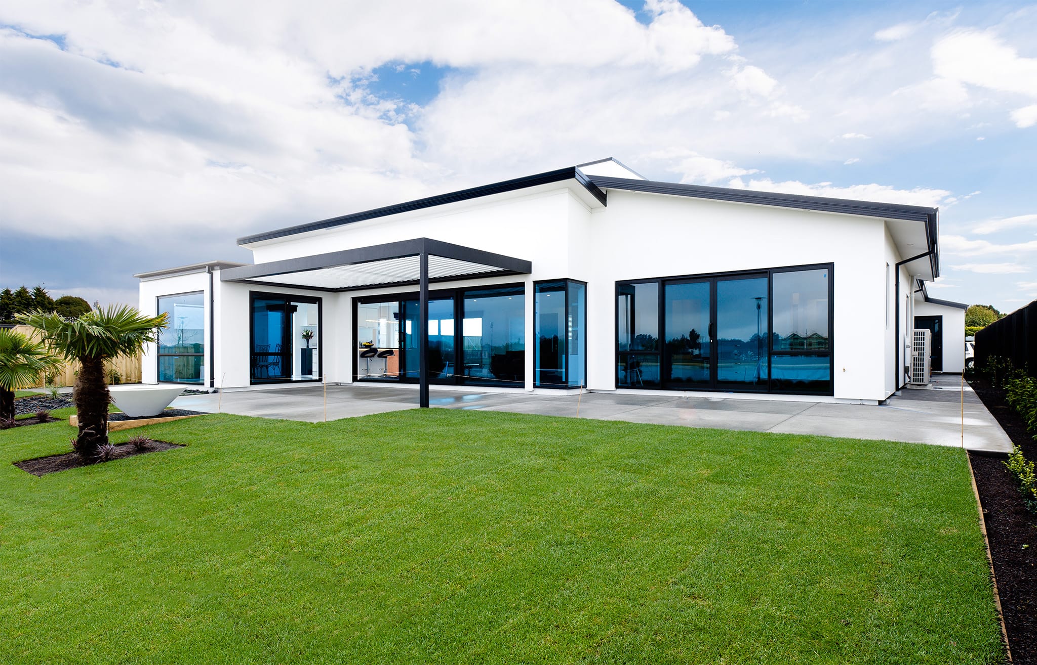 The Blue Glass House new build in Pegasus Lake, North Canterbury built by Trendsetter Homes